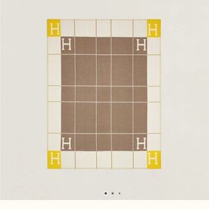 Yellow and Brown Fiber Art with Geometric Symmetry